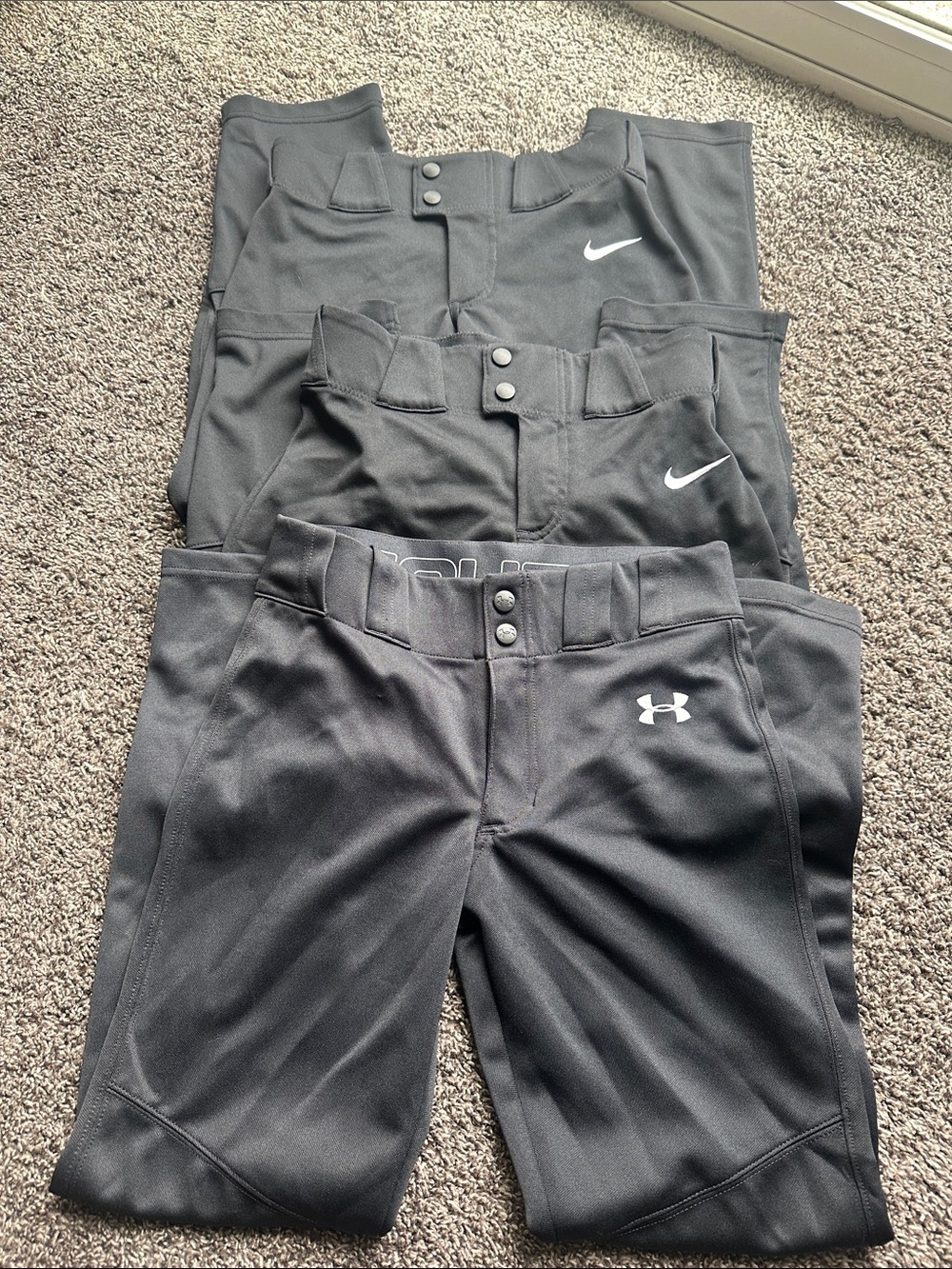 3 pairs of baseball pants Under Armour And 2 Nike Black Kids Baseball pants